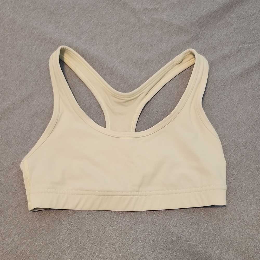 Light yellow TnAction Aritzia racerback sports bra